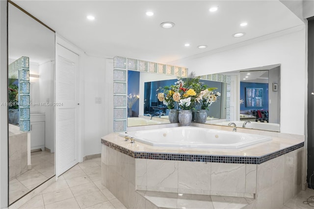 bathroom with a relaxing tiled tub