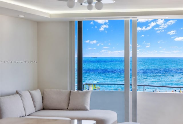 living room featuring a water view