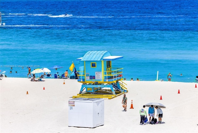 view of water feature with a beach view