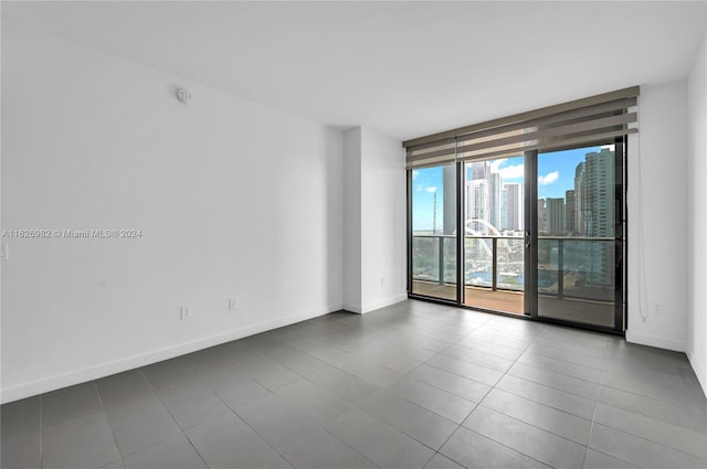 view of tiled spare room