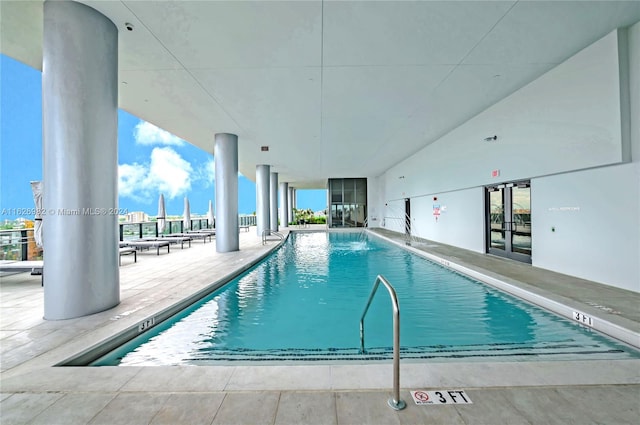 view of swimming pool featuring a patio area