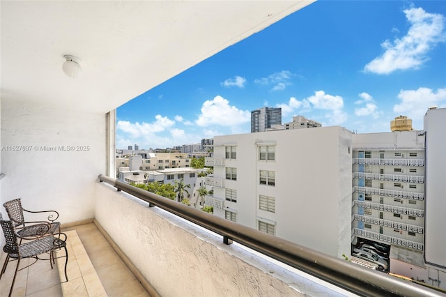 balcony featuring a view of city