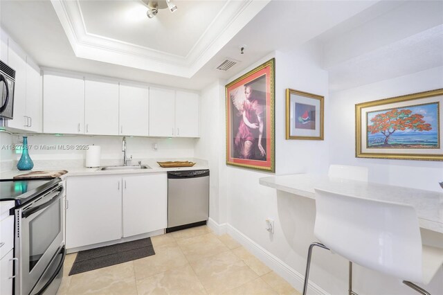 dining room featuring sink and a textured ceiling