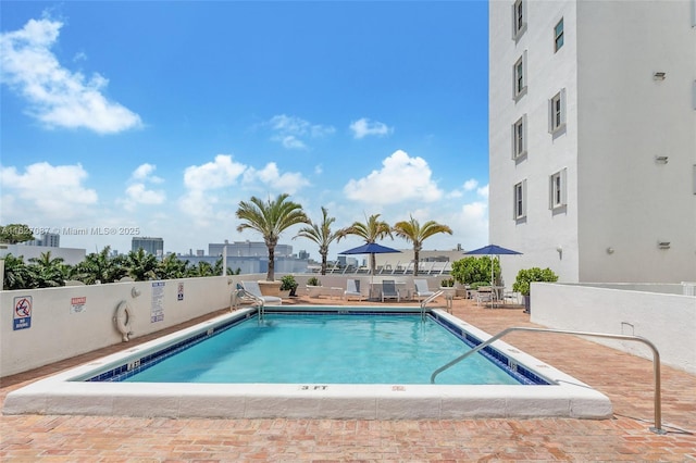 pool with a patio