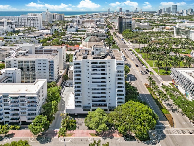 birds eye view of property featuring a city view