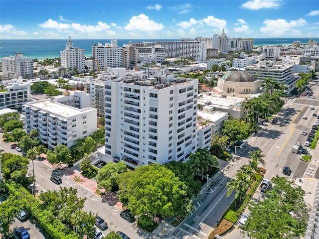 aerial view featuring a view of city and a water view