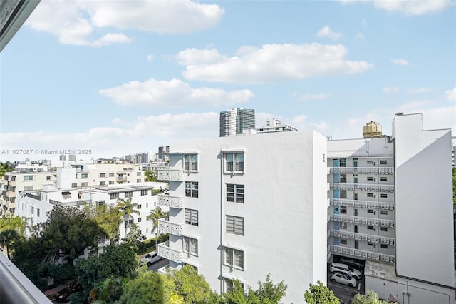 view of building exterior featuring a city view