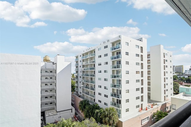 view of building exterior featuring a city view