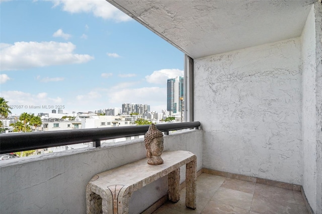 balcony featuring a view of city