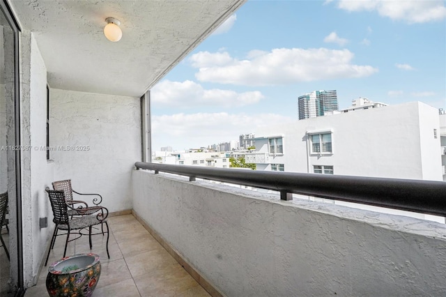 balcony featuring a city view