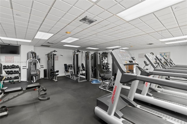 gym with a drop ceiling