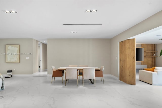 7000 SW 125th St, Pinecrest, FL 33156 - dining area featuring marble finish floors and baseboards