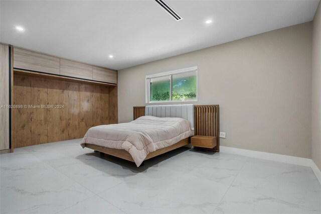 7000 SW 125th St, Pinecrest, FL 33156 - bedroom featuring light marble finish floors, recessed lighting, and baseboards