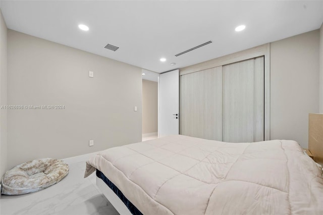 7000 SW 125th St, Pinecrest, FL 33156 - bedroom featuring marble tiled flooring, recessed lighting, and a closet