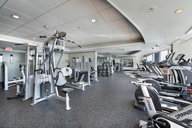 workout area with a paneled ceiling