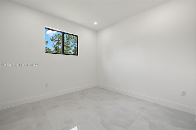 view of tiled spare room