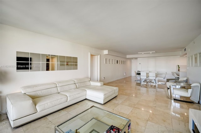 living room with light tile patterned flooring