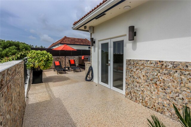 645 NE 9th Ave, Fort Lauderdale, FL 33304 - view of patio / terrace with french doors