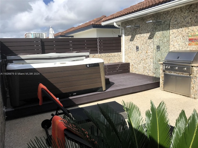 645 NE 9th Ave, Fort Lauderdale, FL 33304 - view of patio / terrace featuring a hot tub, grilling area, and a deck