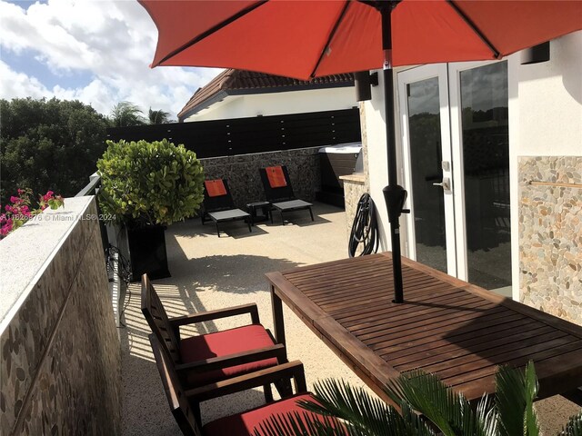 645 NE 9th Ave, Fort Lauderdale, FL 33304 - view of patio / terrace featuring a balcony