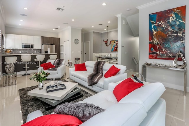 645 NE 9th Ave, Fort Lauderdale, FL 33304 - living room with light tile patterned flooring, recessed lighting, crown molding, and baseboards