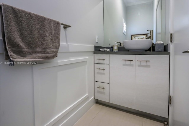 645 NE 9th Ave, Fort Lauderdale, FL 33304 - bathroom with vanity and tile patterned flooring
