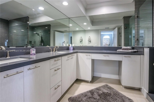645 NE 9th Ave, Fort Lauderdale, FL 33304 - bathroom with a tile shower, double vanity, crown molding, and recessed lighting