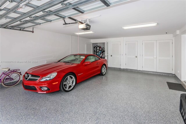 645 NE 9th Ave, Fort Lauderdale, FL 33304 - garage featuring a garage door opener