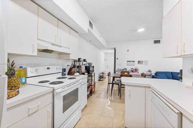 kitchen with white cabinetry, white appliances, and light tile patterned floors