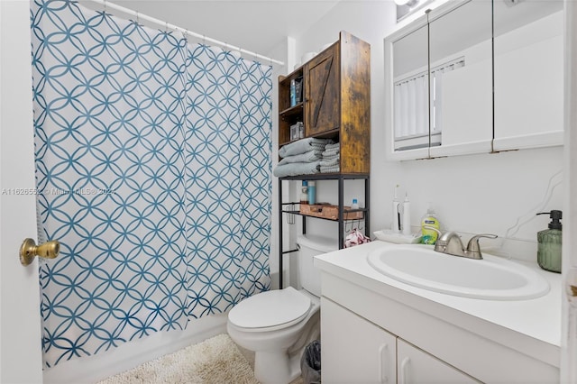 full bathroom with vanity, toilet, and shower / bath combination with curtain