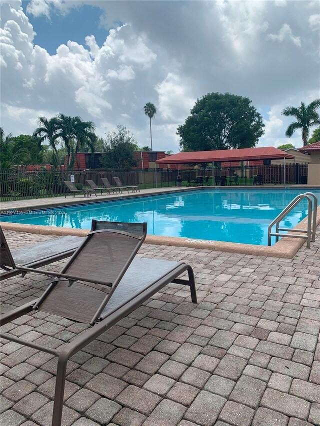 view of pool with a patio