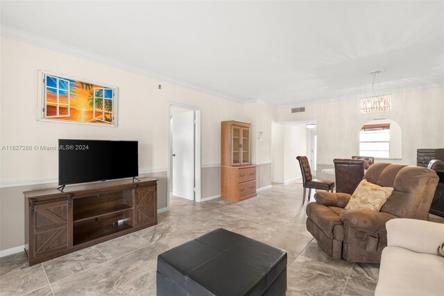 tiled living room featuring crown molding