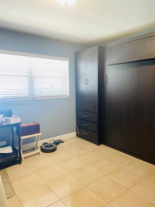 interior space featuring light tile patterned floors