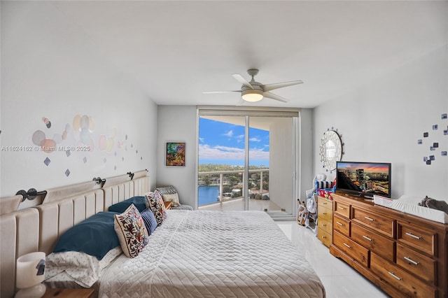 bedroom with ceiling fan and floor to ceiling windows