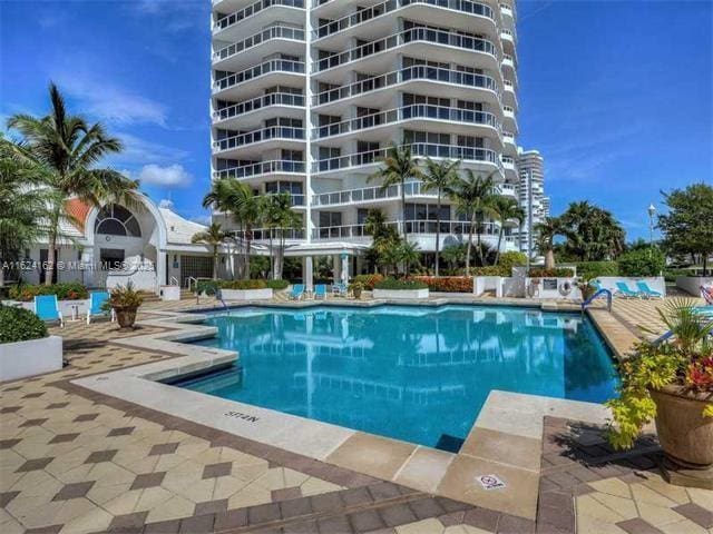 community pool featuring a patio