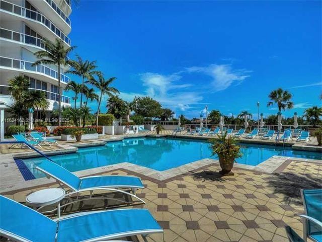 pool featuring a patio area