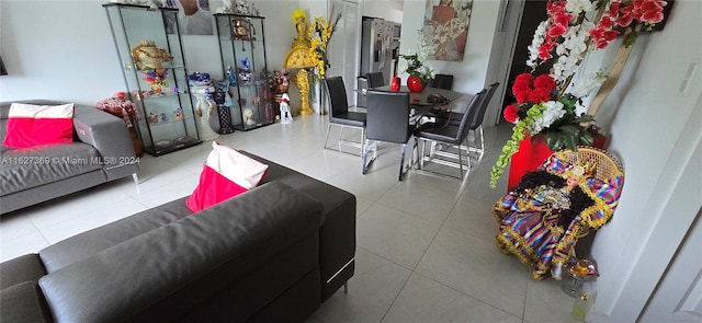 living room featuring light tile patterned flooring