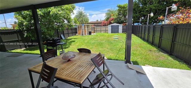 view of patio featuring a storage shed