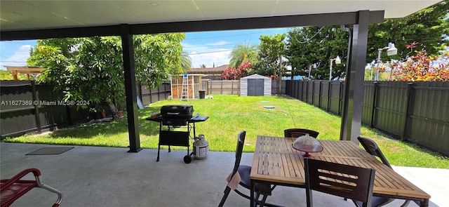 view of patio featuring a shed