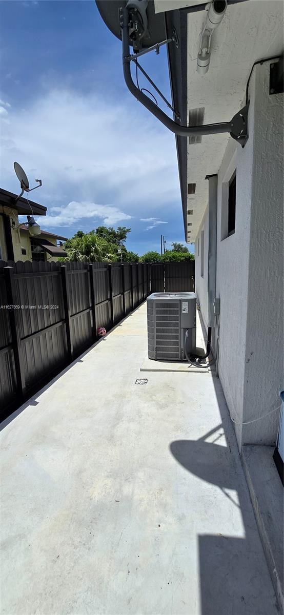 view of patio with central AC unit