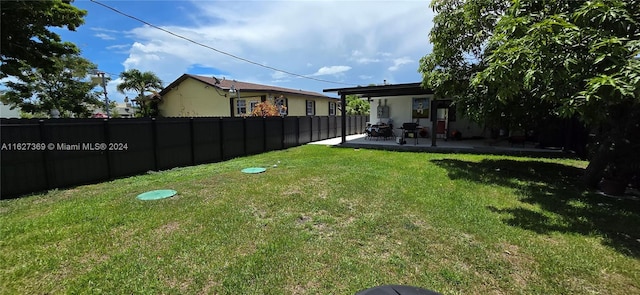 view of yard with a patio area