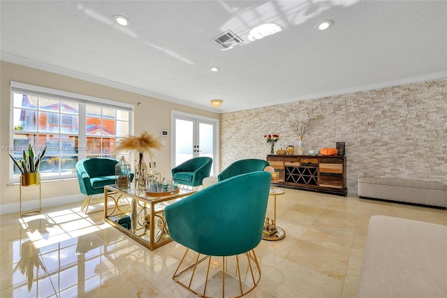 7949 NW 188th Ter, Hialeah, FL 33015 - living area featuring crown molding, french doors, recessed lighting, and an accent wall