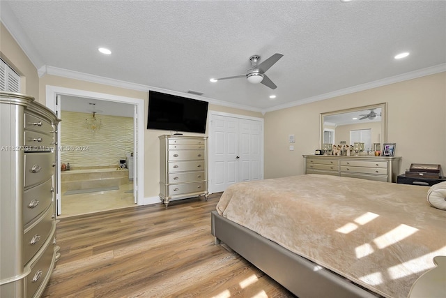 7949 NW 188th Ter, Hialeah, FL 33015 - bedroom featuring light wood finished floors, ornamental molding, a textured ceiling, recessed lighting, and a ceiling fan