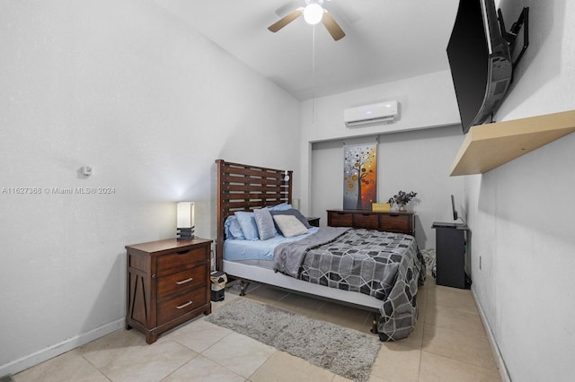 bedroom featuring an AC wall unit, ceiling fan, and light tile patterned floors