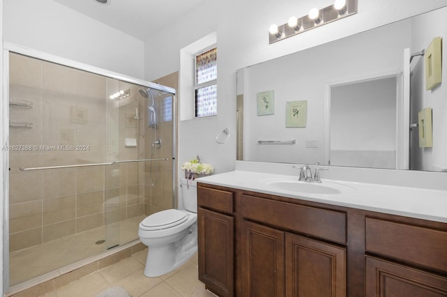 bathroom with vanity, an enclosed shower, tile patterned flooring, and toilet