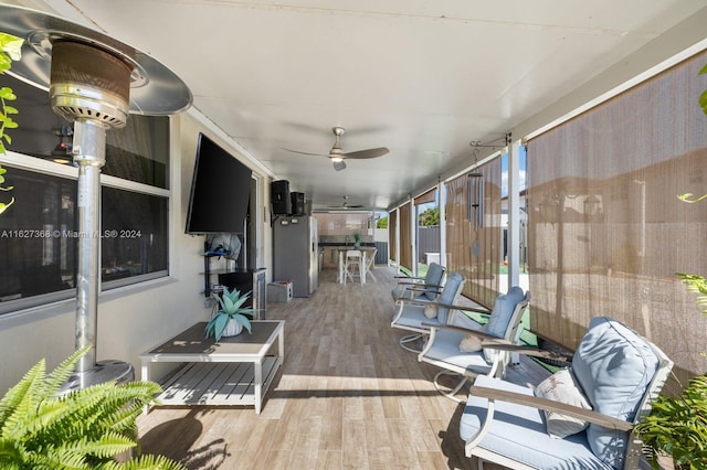 interior space featuring ceiling fan