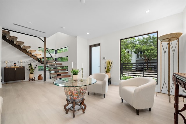 sitting room with light hardwood / wood-style floors