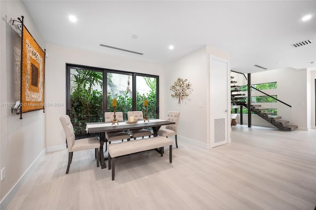 dining room featuring light wood-type flooring