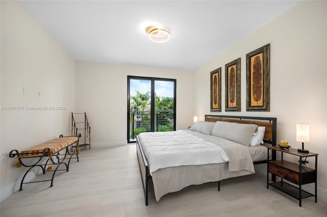 bedroom with light hardwood / wood-style floors