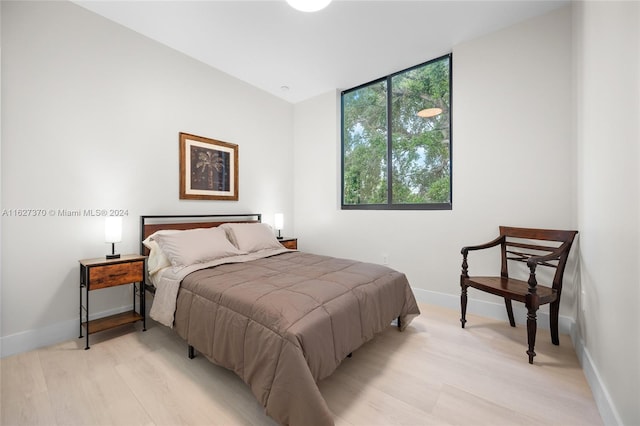 bedroom with light hardwood / wood-style floors